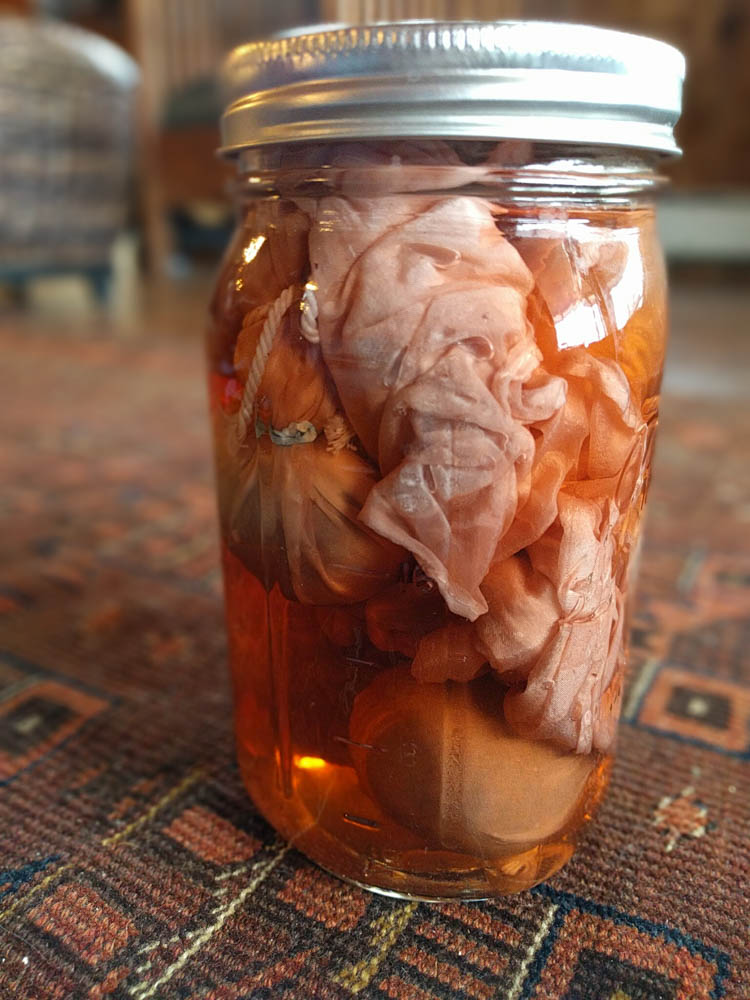 avocado pits wrapped in silk